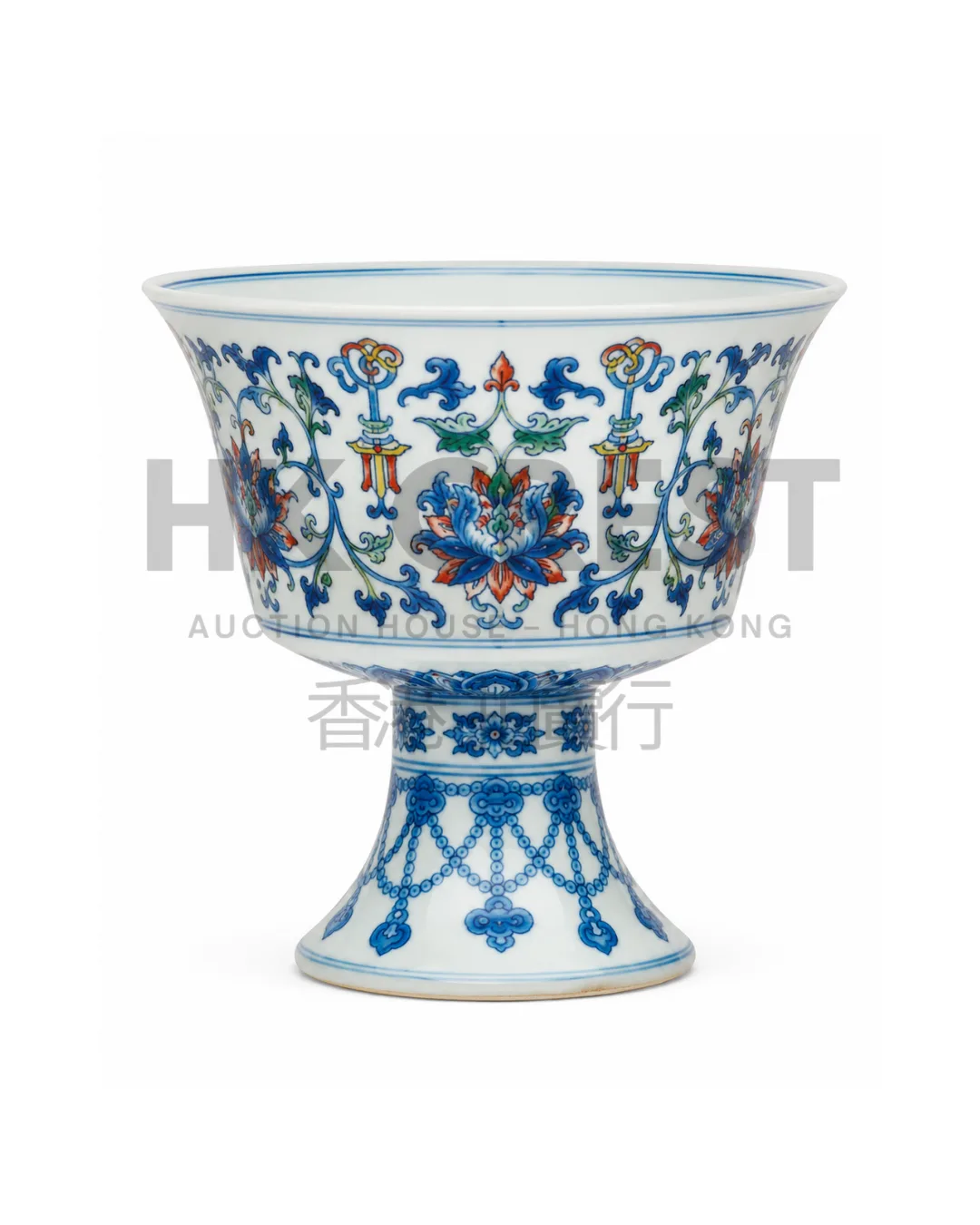 CHINESE STEM CUP IS DECORATED WITH STYLISED LOTUS SPRAYS AND RUYI HEADS IN DOUCAI PALETTE