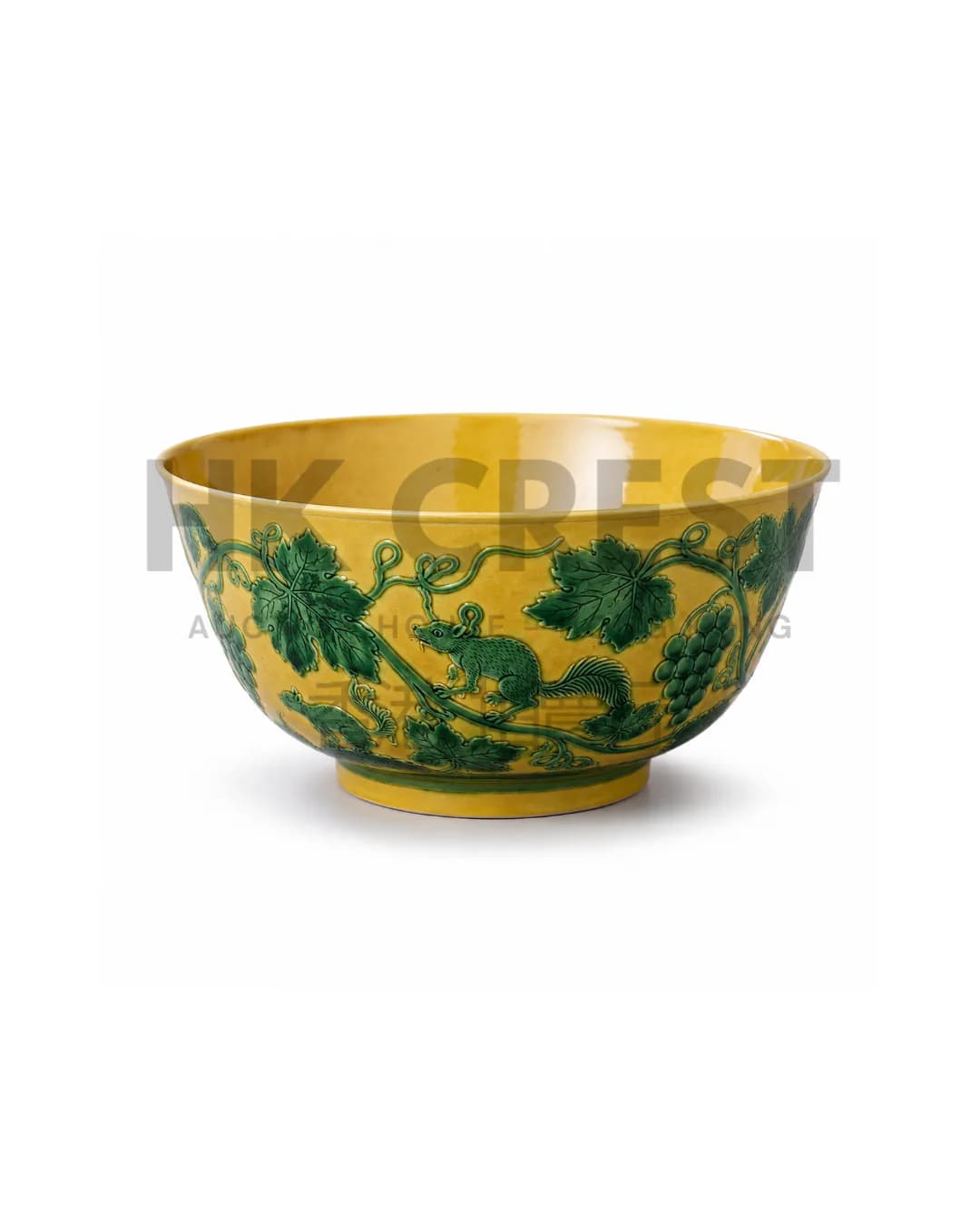 CHINESE YELLOW-GROUND PORCELAIN BOWL PAINTED IN GREEN ENAMEL WITH DRAGONS AMONG CLOUDS…