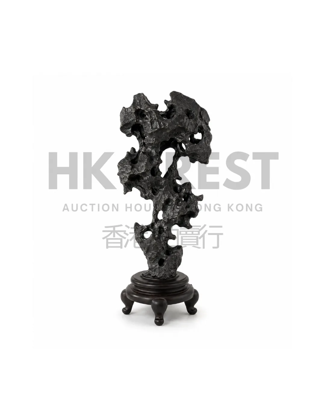 Sculptural black stone object inspired by the irregular contours of a Chinese scholar's…