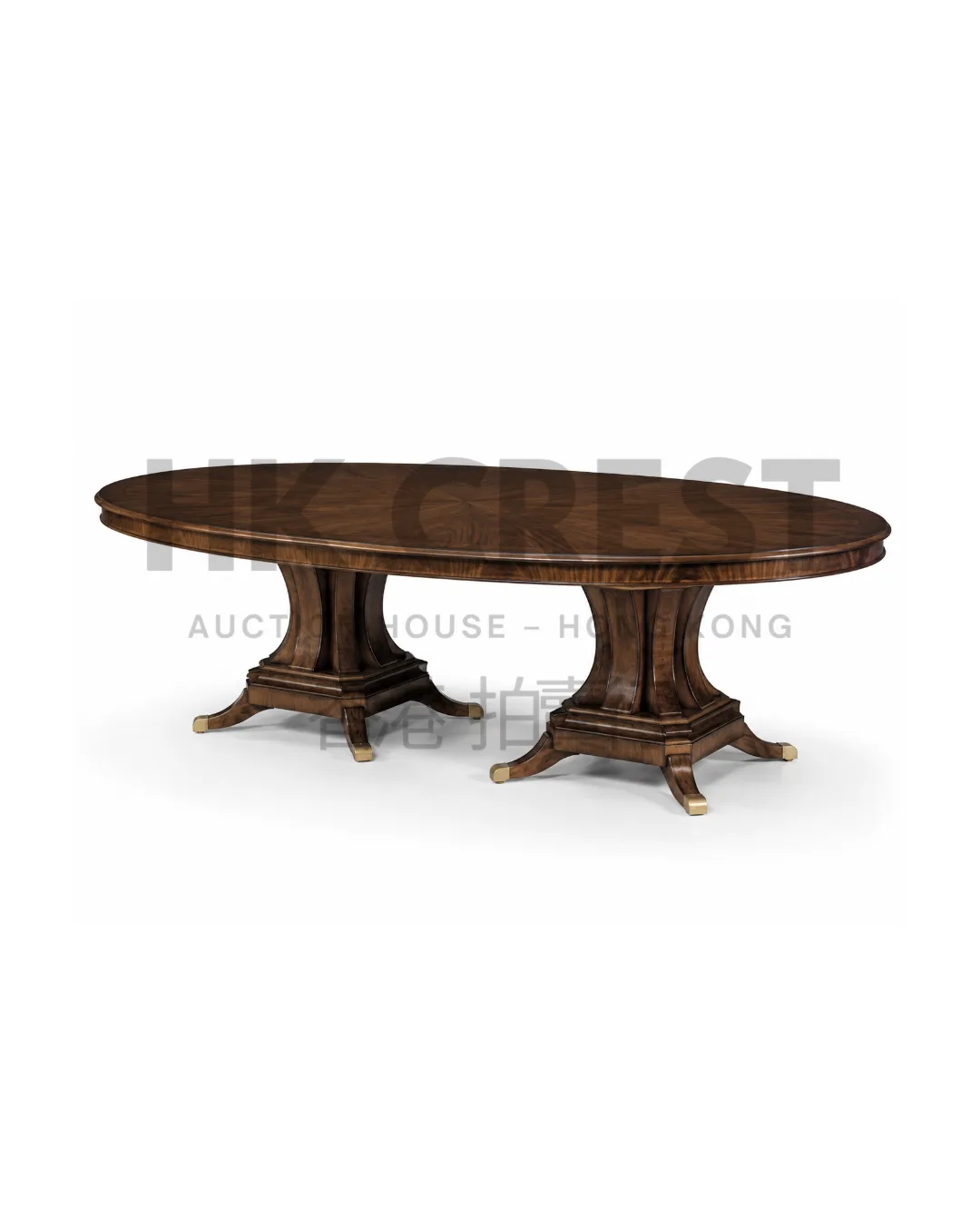 Oval dining table in dark walnut with a smooth veneered top and twin fluted pedestal bases