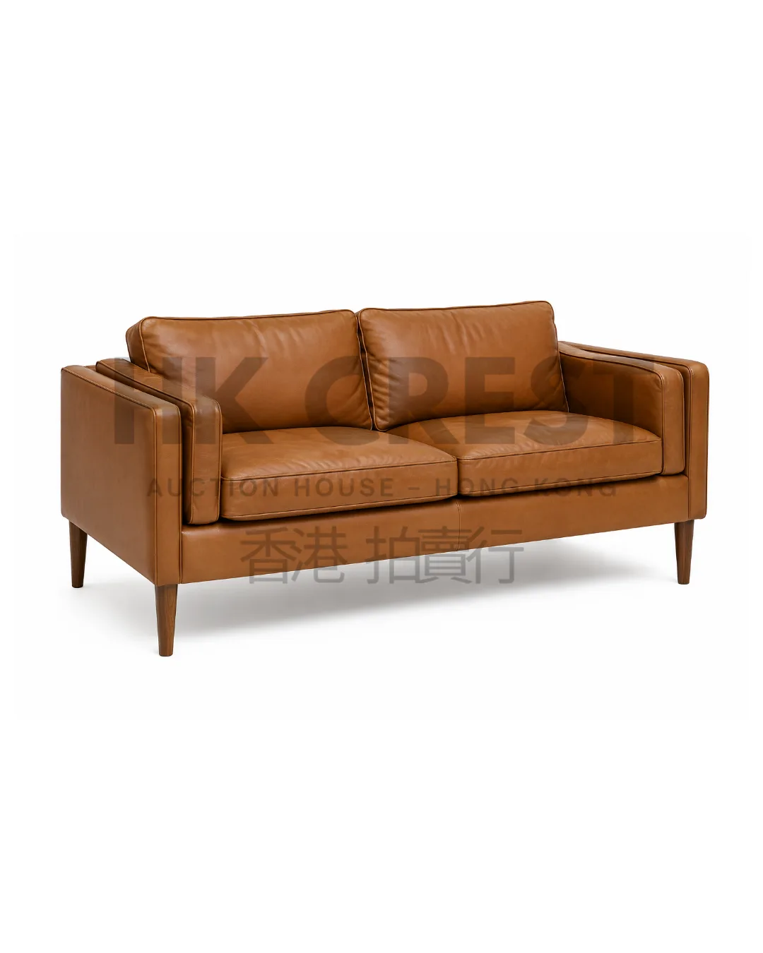 Two-seat sofa in cognac leather with slim arms