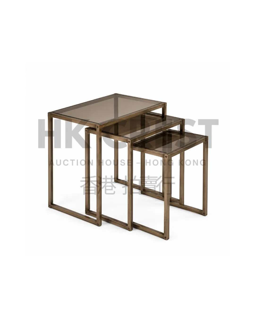 Nest of three side tables with smoked glass tops and slender bronze-finished metal…