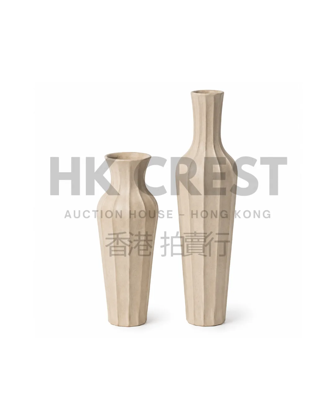 Pair of tall ceramic vases with vertical ribbing and a warm sand-coloured matte glaze