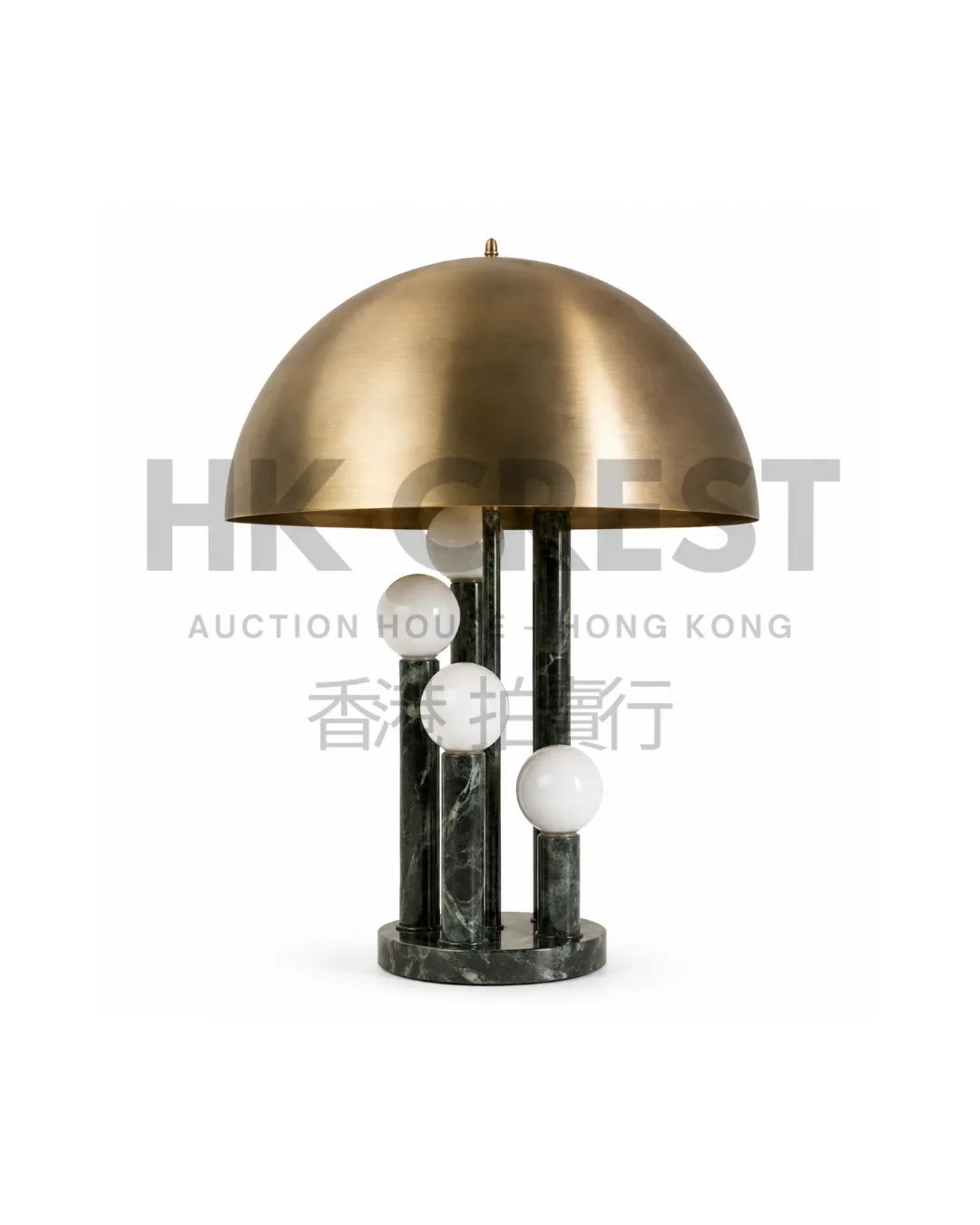 Mushroom-form table lamp with a brushed brass dome shade and cylindrical dark green…