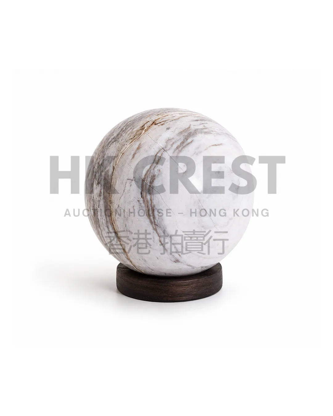 White marble decorative sphere resting on a low dark timber ring base