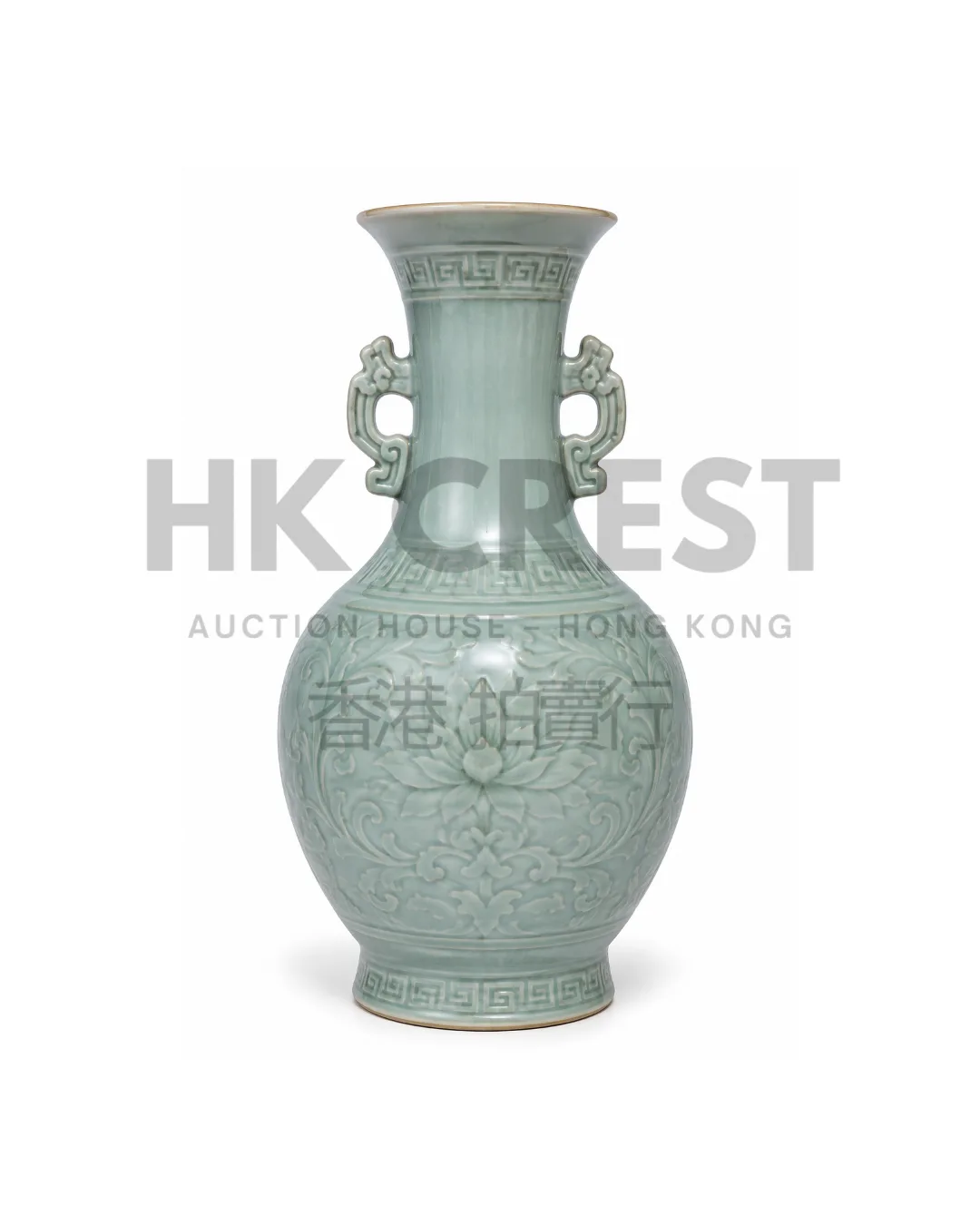 CHINESE VASE IS DECORATED WITH ARCHAISTIC HANDLES AND MOULDED KEY-FRET BANDS IN SOFT…