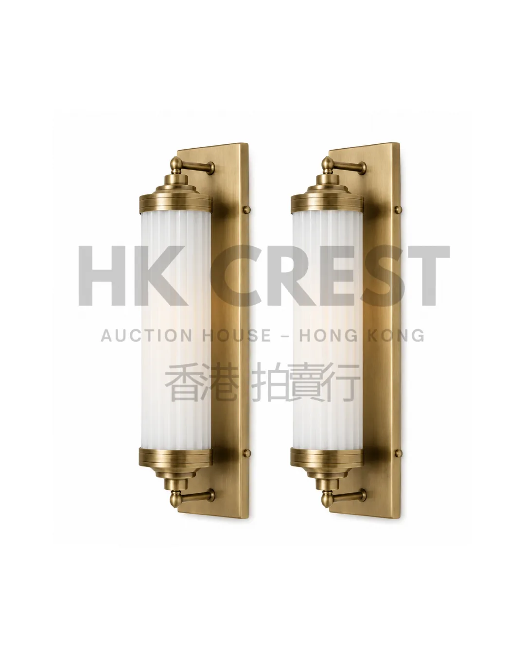 Pair of wall lights with frosted glass cylinders held by slim brushed-brass backplates