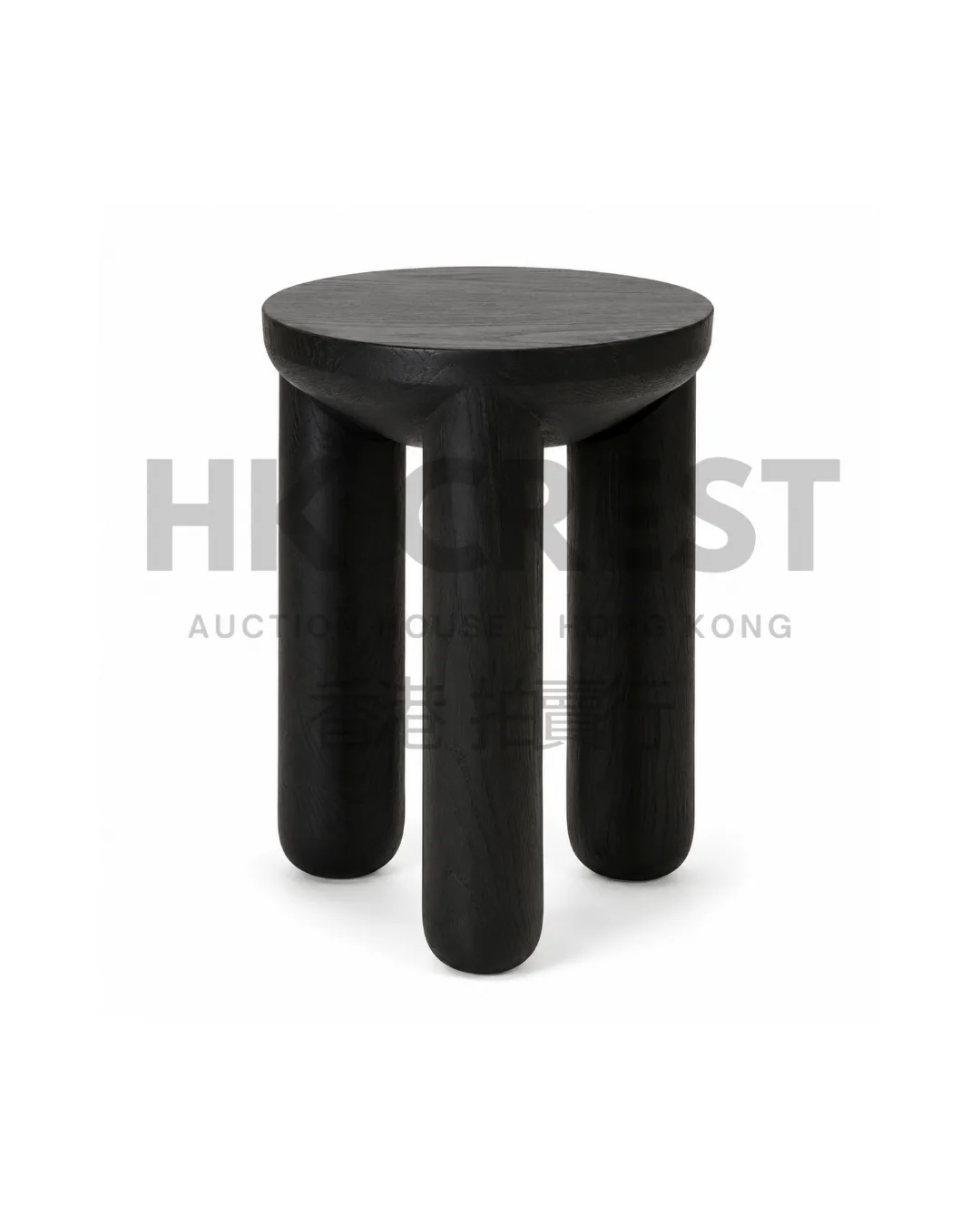 Round side table in dark stained ash with a raised tray-style top and three tapered…