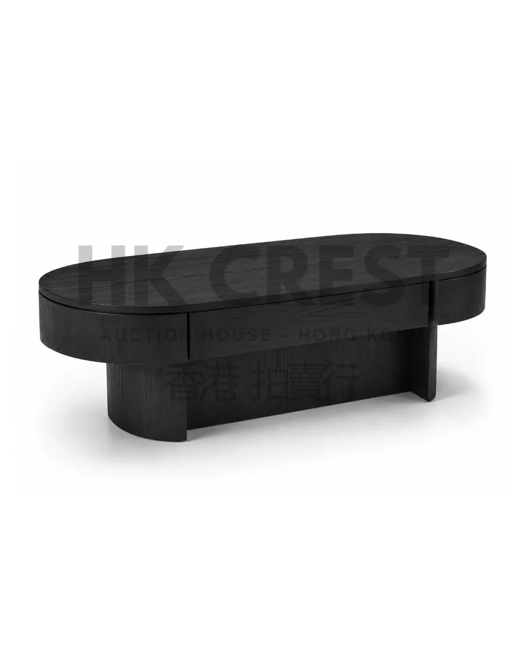 Large oval coffee table in black stained oak with a softly bevelled top and broad…